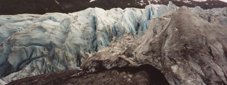 The face of Exit Glacier. The ice appears blue.
            It is so dense that other colours are absorbed.